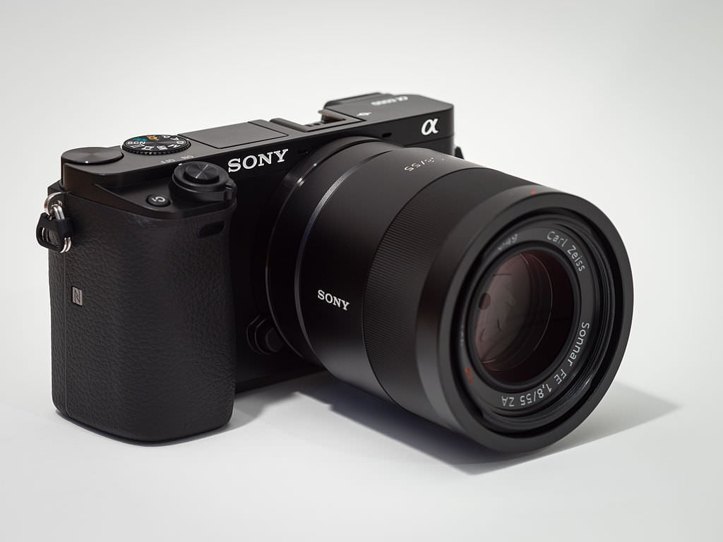Sony Alpha ILCE 6000 APS C frame camera with lens.jpeg image 