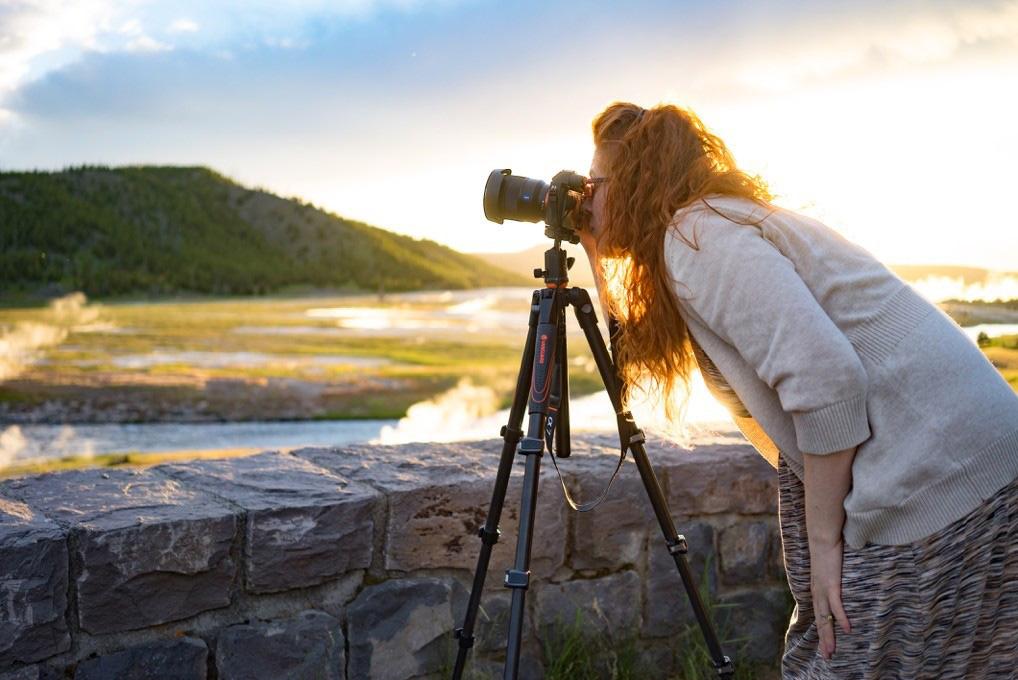 A woman is capturing photos image 