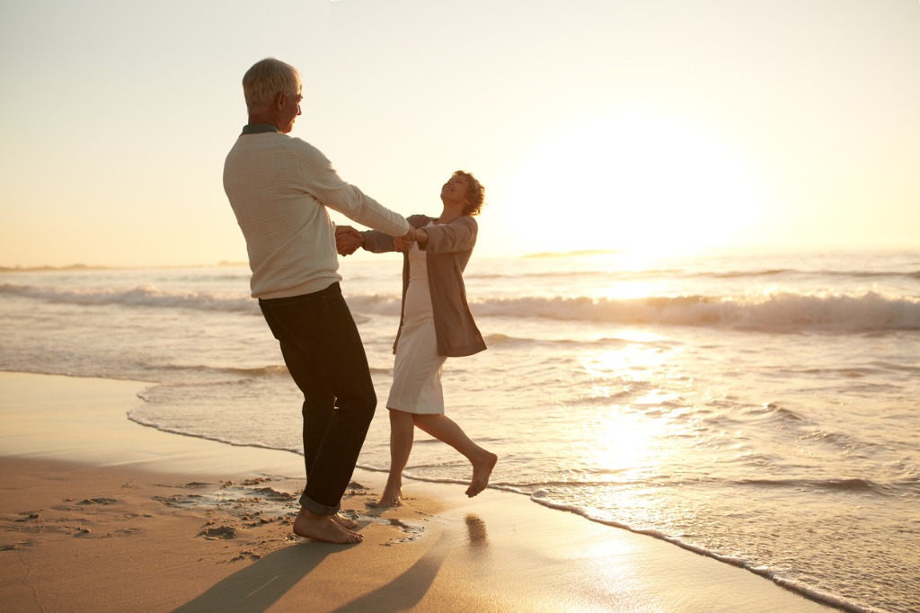 romantic senior couple enjoying a day at the beach picture id628194226 image 