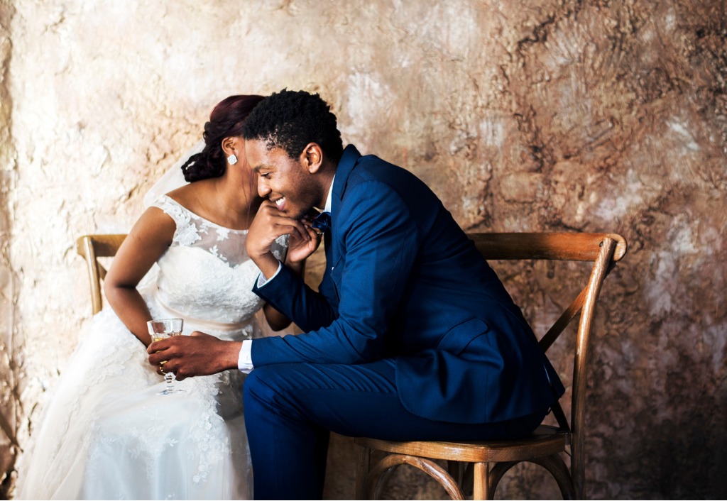 newlywed african descent couple wedding celebration picture id694311156