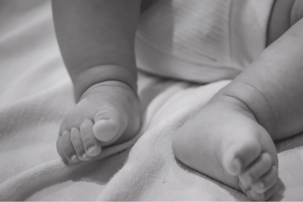 tiny baby feet picture id899392492 image 