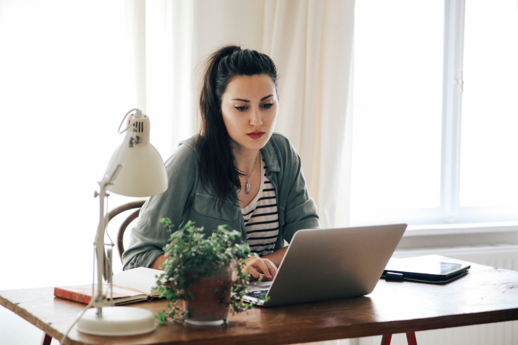young freelancer working at home picture id492679254
