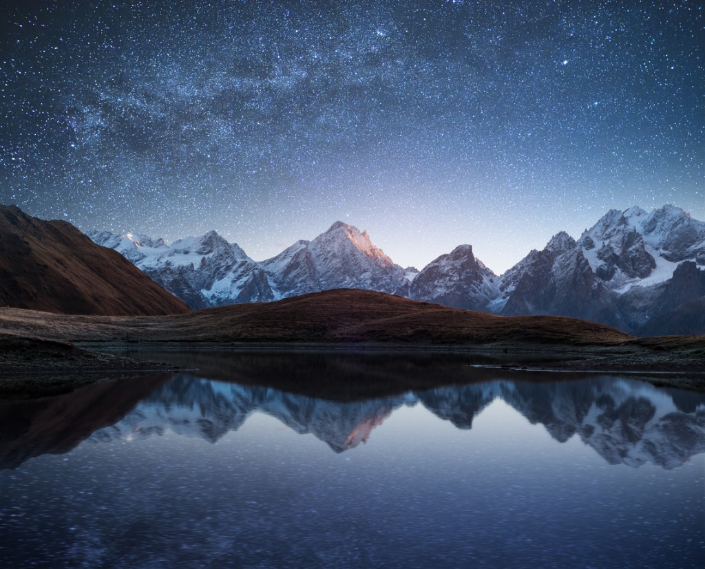 night landscape with a mountain lake and a starry sky picture id940272306 image 