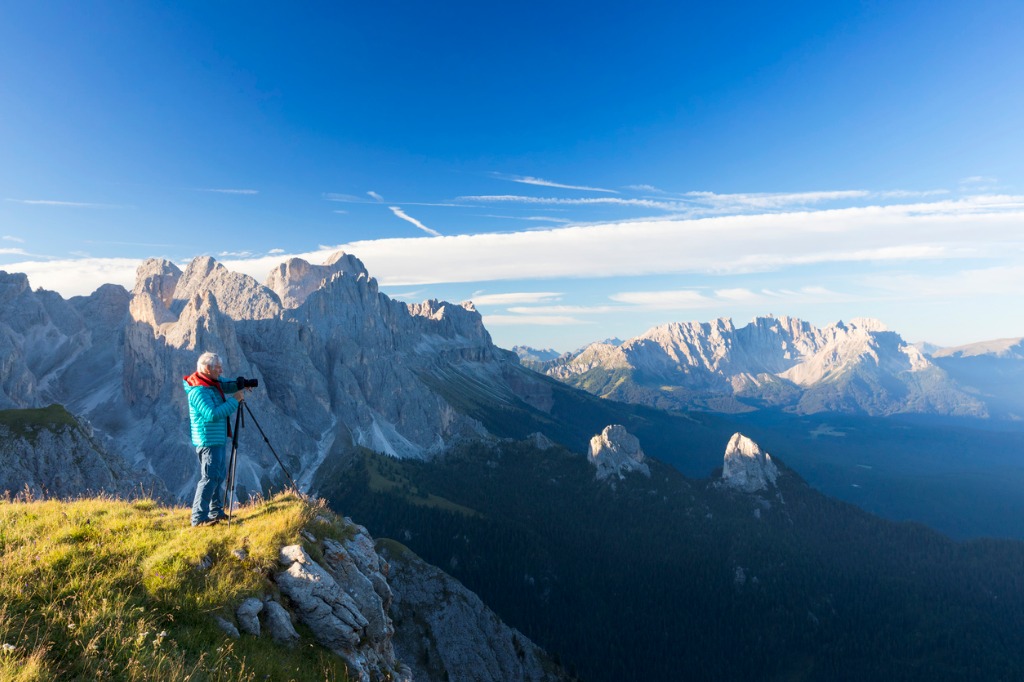 nature photographer in the alps at catinaccio latemar mountain group picture id946758390 image 