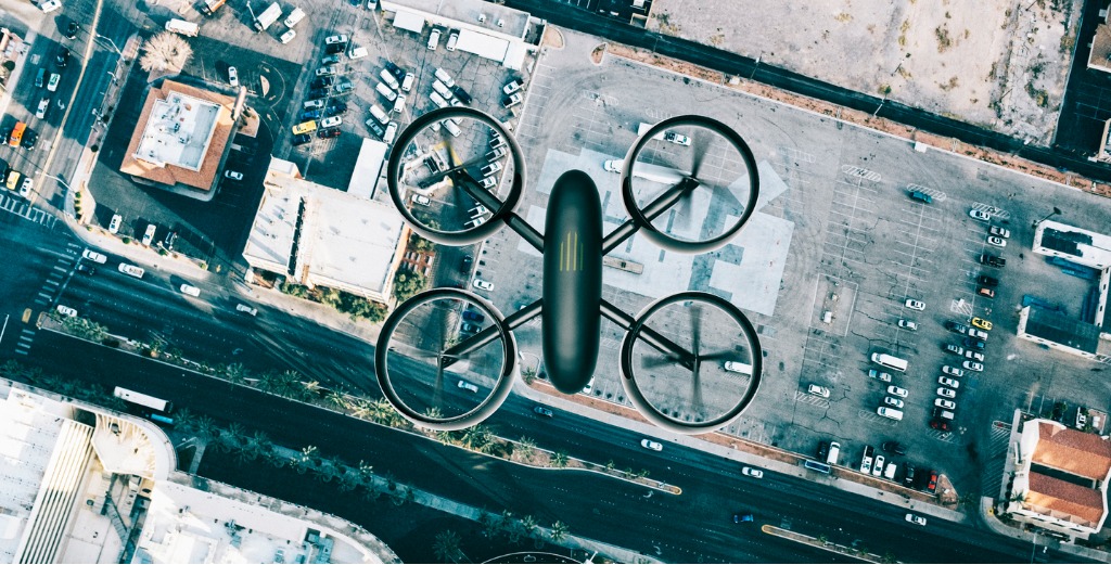 drone hoovers over city in high angle view picture id831440460