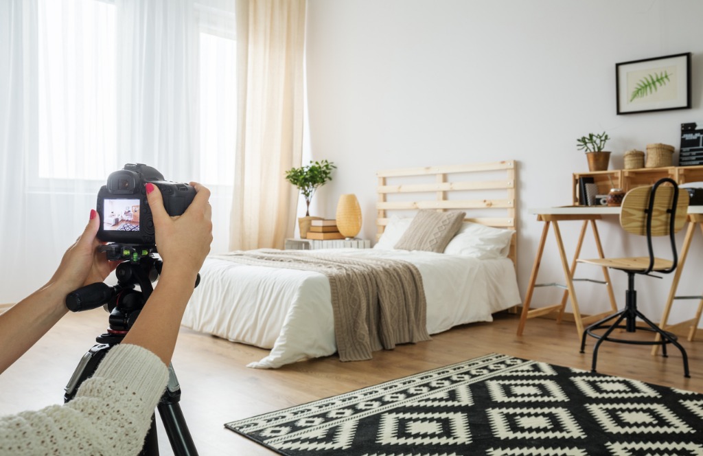blogger taking a photo of bedroom picture id838217420