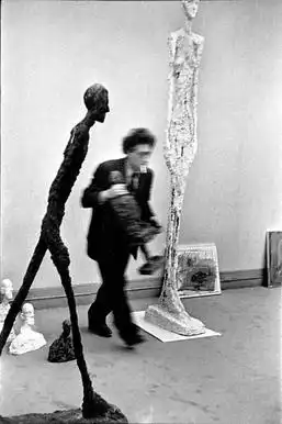 Photograph of Alberto Giacometti captured by Henri Cartier-Bresson. This work done by the best photographer of all time would be remembered for years to come and the afterlife! image 