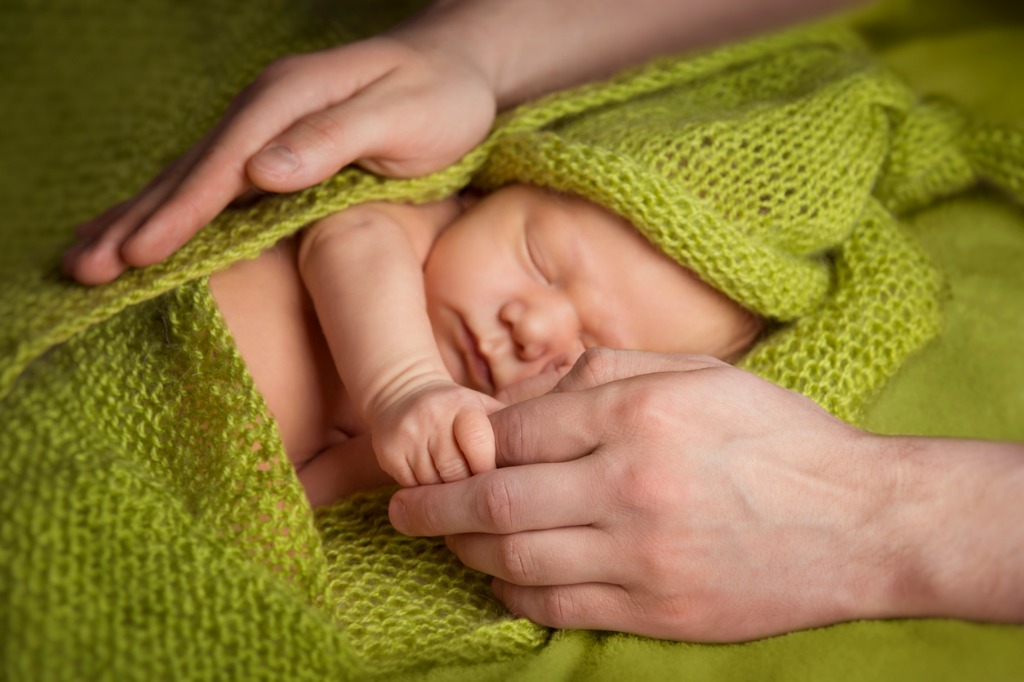 newborn baby sleep in parent hands sleeping new born kid child and picture id680684508 image 