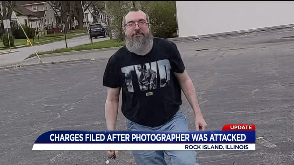 enraged man smashes photographers camera image 