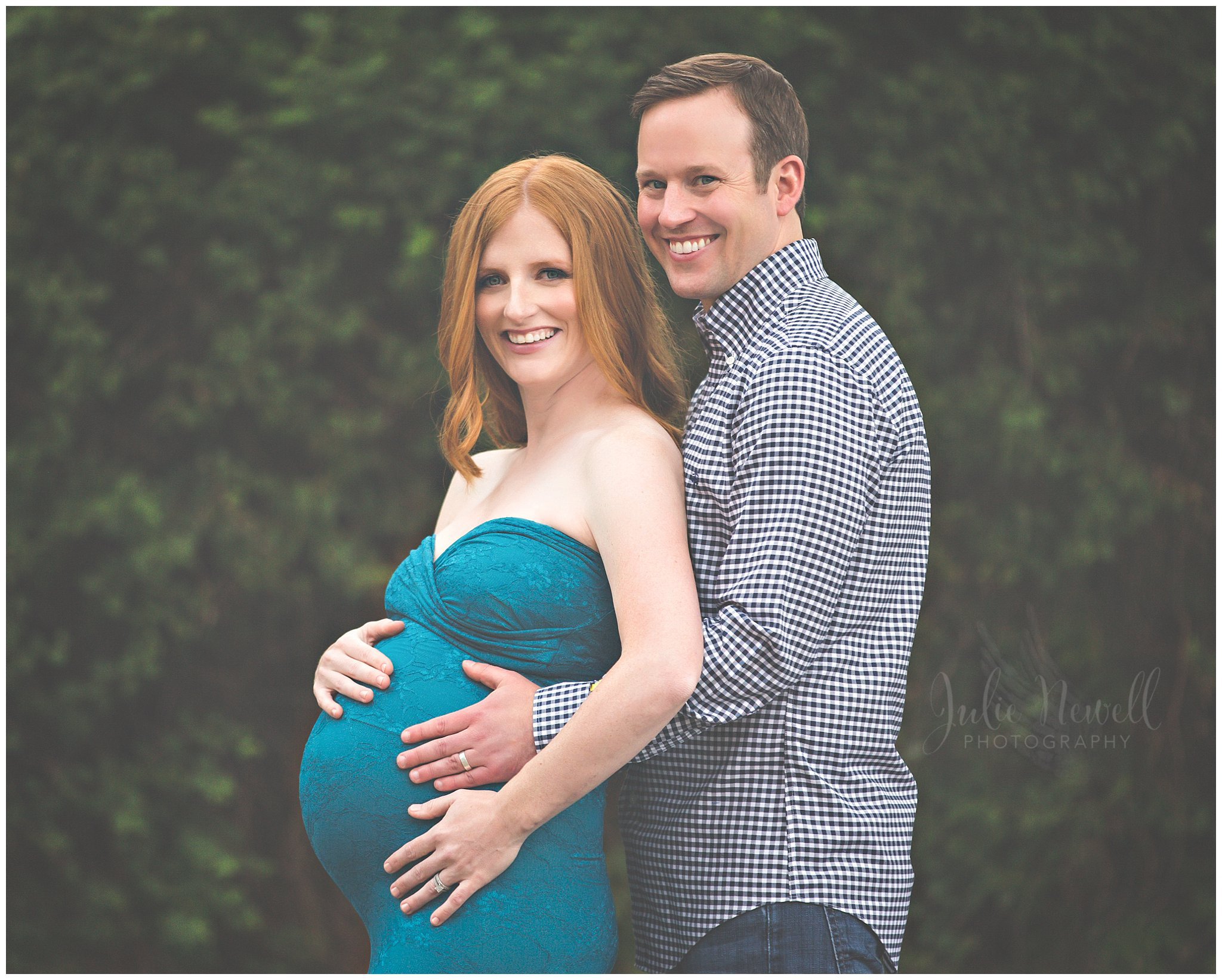 couple poses for maternity shoot image 